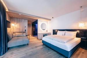 Posteľ alebo postele v izbe v ubytovaní ZillergrundRock Luxury Mountain Resort