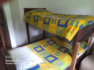 Poschodová posteľ alebo postele v izbe v ubytovaní Villa Lourdes