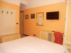 Postel nebo postele na pokoji v ubytování Hotel Salus
