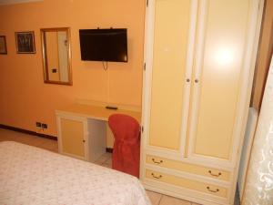 Postel nebo postele na pokoji v ubytování Hotel Salus