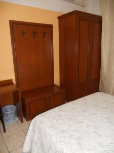 Postel nebo postele na pokoji v ubytování Hotel Salus