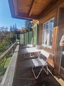 Een balkon of terras bij Chalet Edelweiss Sigriswil