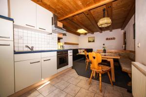 Kuchyň nebo kuchyňský kout v ubytování Appartement Winkler