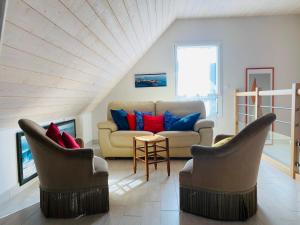 Area tempat duduk di REF 052 Maison pour 7 personnes à proximité du Golfe du Morbihan à louer pour les vacances
