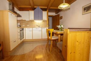 Kuchyň nebo kuchyňský kout v ubytování Appartement Winkler