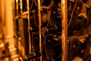 a close up of a bunch of wine bottles at Halvard Hotel in Douglas