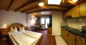 Kuchyň nebo kuchyňský kout v ubytování Appartement Winkler