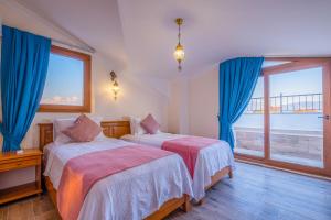 En eller flere senge i et værelse på Infinity Myra Villa + 45 billeder