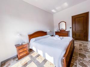 A bed or beds in a room at MYHOUSE INN TOGLIATTI - Affitti Brevi Italia