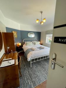 מיטה או מיטות בחדר ב-Milvil