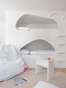 Neuro Campus Hotel客房内的一张或多张床位