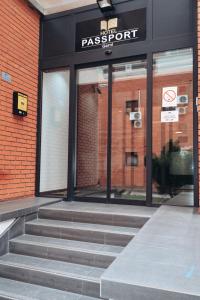 a store front with stairs in front of a building at Hotel Passport in Belgrade