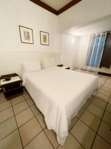 
Cama ou camas em um quarto em Delphin Hotel
