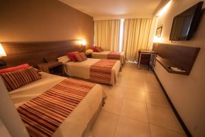 TV a/nebo společenská místnost v ubytování Hotel Estilo MB - Villa Carlos Paz
