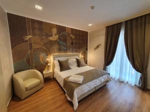 Postel nebo postele na pokoji v ubytování Amsterdam Suite Hotel & SPA