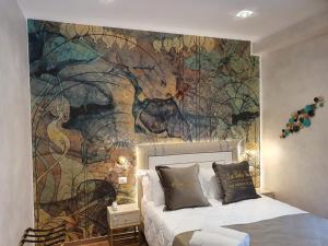 Postel nebo postele na pokoji v ubytování Amsterdam Suite Hotel & SPA