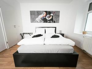 Postel nebo postele na pokoji v ubytování Stilvolles 1-Zimmer-Apartment im beliebten Plagwitz