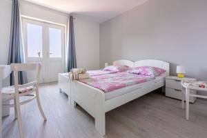 Ein Bett oder Betten in einem Zimmer der Unterkunft House Milenka