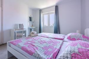 Ein Bett oder Betten in einem Zimmer der Unterkunft House Milenka