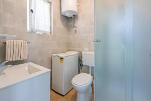 Ein Badezimmer in der Unterkunft House Milenka