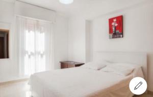 Posteľ alebo postele v izbe v ubytovaní Apartamento vacacional Costa del Sol