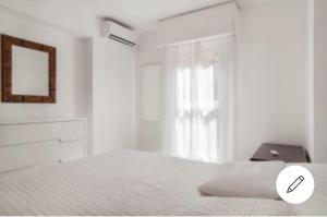 Posteľ alebo postele v izbe v ubytovaní Apartamento vacacional Costa del Sol