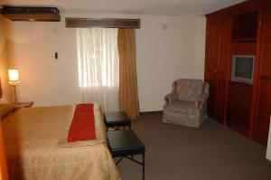 Cama ou camas em um quarto em Real de Minas San Luis Potosi