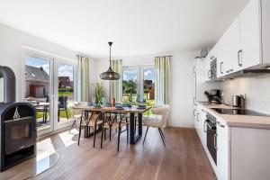 Kuchyň nebo kuchyňský kout v ubytování NordseeResort Büsum Ferienhaus 1 Beach House