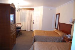 Cama ou camas em um quarto em Real de Minas San Luis Potosi