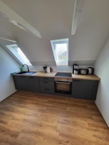 Kuchyň nebo kuchyňský kout v ubytování FeWo-Butze 4 mit Balkon