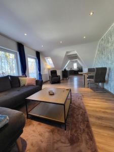 Posezení v ubytování FeWo-Butze 4 mit Balkon