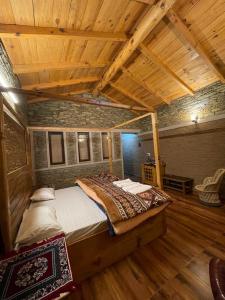 Ένα ή περισσότερα κρεβάτια σε δωμάτιο στο Meraki Huts