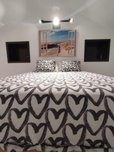 A bed or beds in a room at Carihuela Home