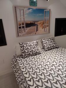 A bed or beds in a room at Carihuela Home