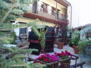 Vonkajšia záhrada v ubytovaní Hostal Restaurante La Muralla