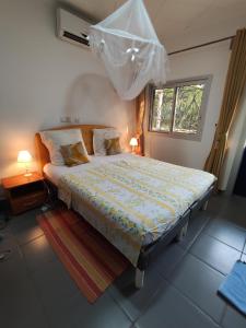 Llit o llits en una habitació de Maison MIDAREA