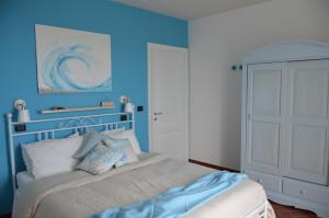 Letto o letti in una camera di Gaia e Levante