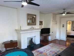 A television and/or entertainment centre at Sweet Apartment, next to Randolph College