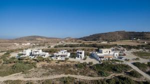 an aerial view of a white villa in the desert at Galini in Agia Irini Milos