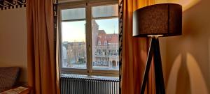 TV a/nebo společenská místnost v ubytování Hotel Theater Figi