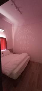 Postel nebo postele na pokoji v ubytování Yueli Homestay