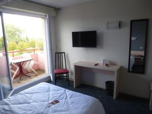 Postel nebo postele na pokoji v ubytování Hotel Agena Hagondange