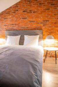 Postel nebo postele na pokoji v ubytování Moon Hostel Warszawa