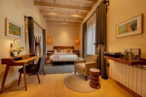 Postel nebo postele na pokoji v ubytování Taller de Juan - Casa Hotel