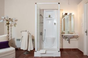 a bathroom with a shower and a sink at Villa Dafnies in Ágios Prokópios +21 photos