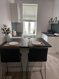 Kuchyňa alebo kuchynka v ubytovaní Wspólna 54 - Blue - Good Apartments