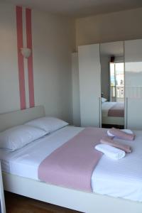 Postel nebo postele na pokoji v ubytování Apartments Renata