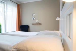 Ein Bett oder Betten in einem Zimmer der Unterkunft Apartment-Residenz Ostseestrand Apartment-Residenz Ostseestrand 11