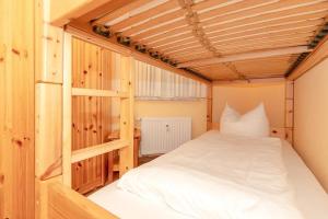 Postel nebo postele na pokoji v ubytování Apartmenthaus Atlantik Apartmenthaus Atlantik 212
