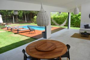 A piscina localizada em Casa Bruna - Praia de Pipa ou nos arredores